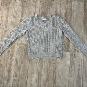 Women’s grey Hollister v-neck sweater size medium.